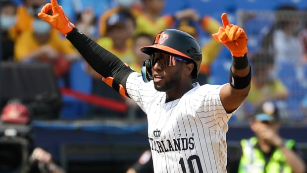 Netherlands batter Jurickson Profar runs back to the home base after hitting a solo home run against Panama during the World Baseball Classic (WBC) at the Taichung Intercontinental Baseball Stadium in Taichung, Taiwan, Thursday, March 9, 2023. (AP Photo/I-Hwa Cheng)